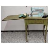 Singer Model 348 Sewing Machine, Button Hole Maker, and Cabinet