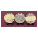 (3) 1964 Kennedy Half Dollars