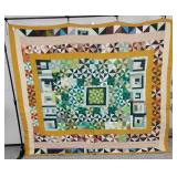Green and Gold Patchwork Quilt