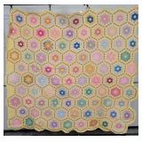 Yellow Patchwork Quilt with Scalloped Edges