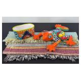 Frog, Flower Pot and Woven Rugs