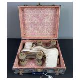 Suitcase with Vintage Rollerskates
