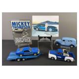 Mickey Thompsons’ MACH 1 Die Cast Model Ford Truck, Trailer, Mustang, Coin Bank, & Book