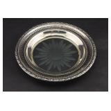 A Sterling Silver Rimmed Champaigne Bottle Coaster
