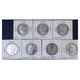 Seven 40% Kennedy Half Dollars