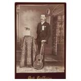 Cabinet Card of Gentleman with Guitar