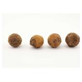 Four Excavated Iron Round Shot