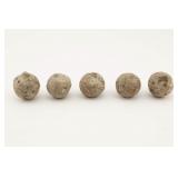 Five Excavated Lead Round Balls