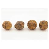 Four Excavated Iron Round Shot