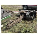 Skidloader trencher attachment