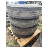 Stack of 11R22.5 tires (4)