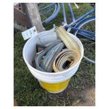 Bucket of ratchet straps