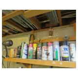 all spray paints on shelf & light