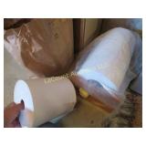 large rolls paper towel on dispensing roll