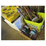 assorted fishing supplies rods line worm bedding