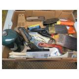 paint brushes sanding discs nail gun