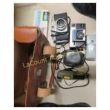2 kodak camera accessories in case instamatic