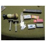 assorted razors blades shaving brush supplies
