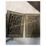 2 symonds cast iron wall grates