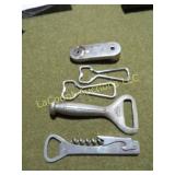 assorted bottle openers cork screw recapper