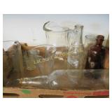 asorted bottles beaker pitcher