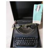 Remington Rand typewriter in case