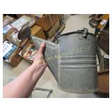 galvanized sprinkling can