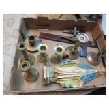 assorted candle holders religious figure crosses