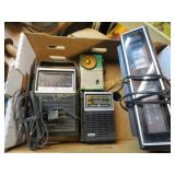 assorted radios green Sony, flip clock