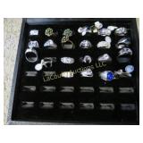 assorted rings in display box costume jewelry