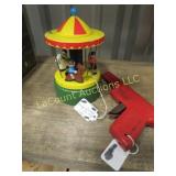 merry go round music box tin water gun