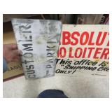 2 signs customer parking no loitering