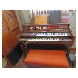 organ w stool and music