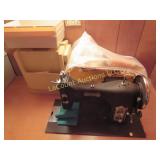 Domestic sewing machine w spools