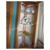 all decor in top cabinet coffee pot stemware clear