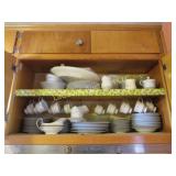 china set some clear glassware all in cabinet