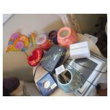 assorted decor candles clock radio picture frame