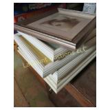 assorted framed print pictures