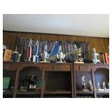 assorted vintage trophies hockey golf