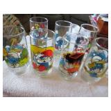 7 vintage Smurf glasses