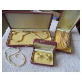 Pearls earrings necklaces Mikimoto on the boxes