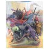 41 small plastic dinosaurs