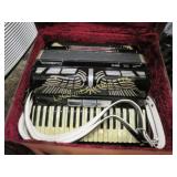 Vintage Morbidoni accordian in case w music