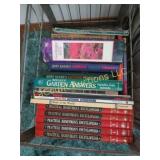 gardening and bird books handyman in milk crate