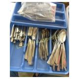 mixed flatware silverware in organizers