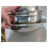 stack of stainless mixing bowls