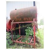 large tank on stand dated 1946