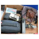 assorted cameras Kodak Nikon clamp on light
