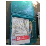 covered tote drawing supplies paper paint brushes