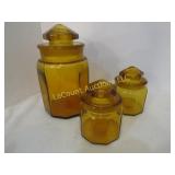 3 vintage LE Smith panel amber canisters